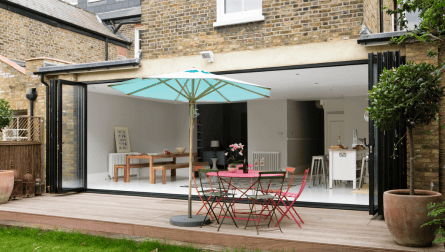 Open bifold doors looking back into the property